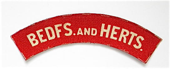 WW2 Beds & Herts Regiment Printed Cloth Shoulder Title Badge