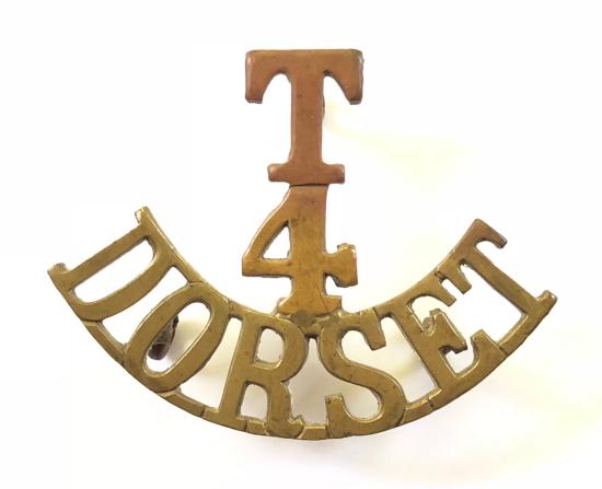T / 4 / DORSET brass shoulder title circa 1908-21.