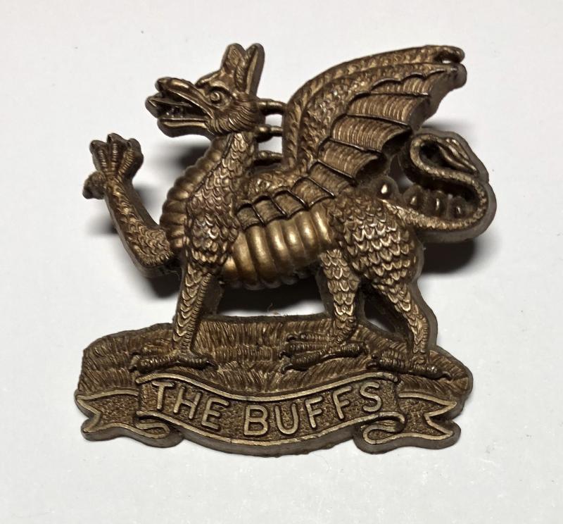 The Buffs, East Kent Regiment WW2 plastic economy cap badge.