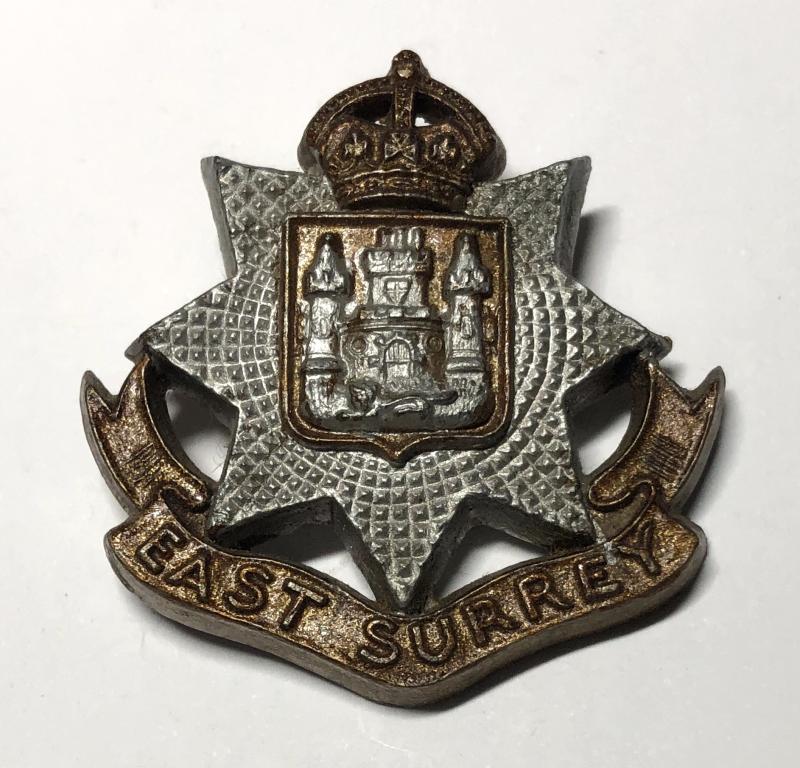 East Surrey Regiment personalised WW2 plastic economy cap badge.