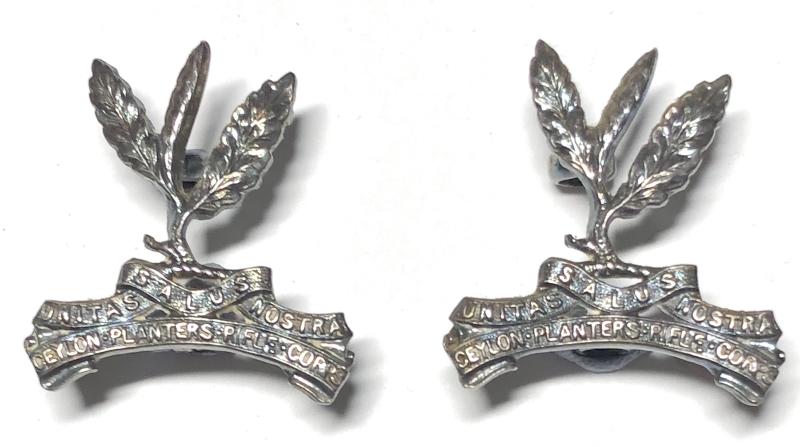 Ceylon Planters Rifle Corps Officer’s pair of silver collar badges.