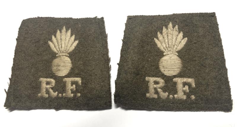 Royal Fusiliers WW1 pair of slip-on shoulder titles.