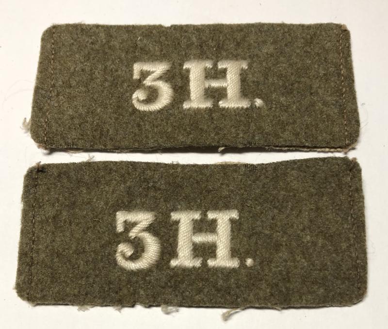 3rd King’s Own Hussars pair of WW1 slip-on shoulder titles.