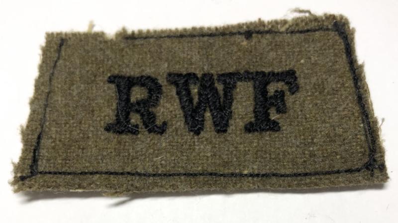 Royal Welch Fusiliers WW2 RWF slip-on shoulder title.