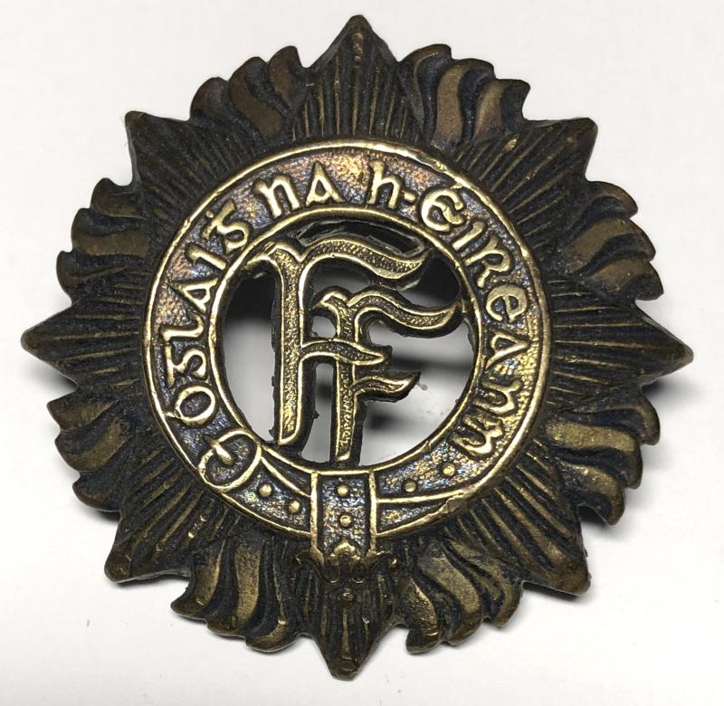 Irish Defence Forces vintage cap badge.