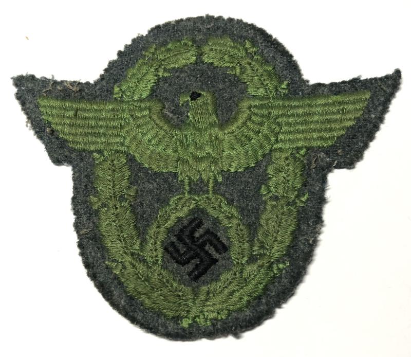 German Third Reich Police WW2 1942 SchutzPolizei sleeve eagle and swastka.