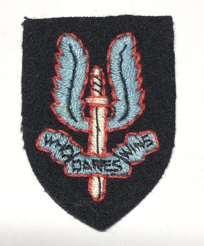 Special Air Service late WW2 cloth SAS beret badge.
