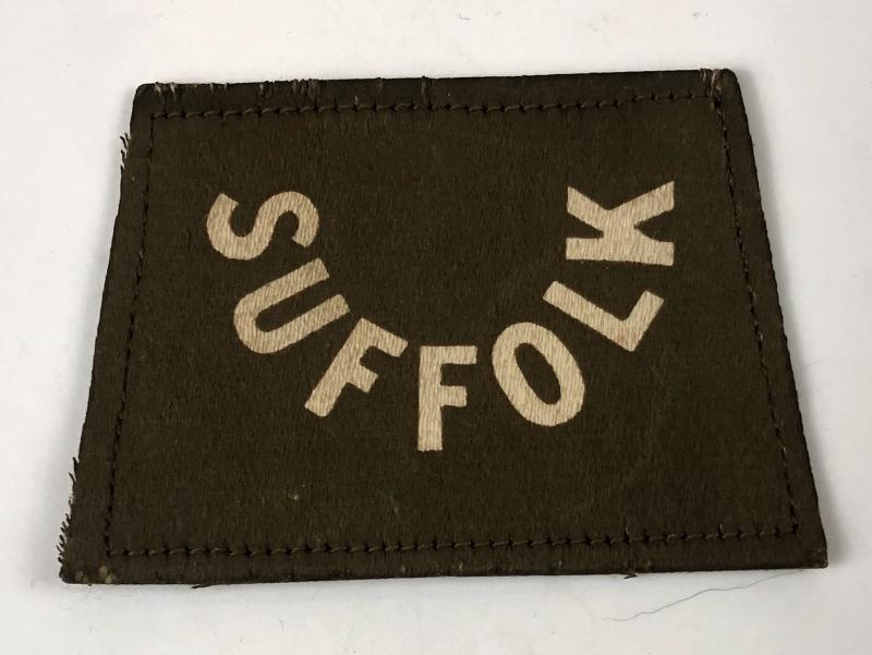 SUFFOLK Regiment WW1 slip-on shoulder title.