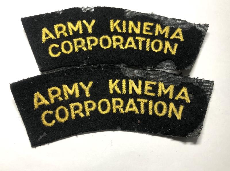 ARMY KINEMA CORPORATION pair of cloth shoulde titles.