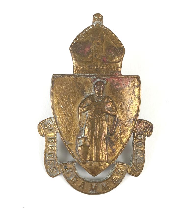 St. Bede's Grammar School cap badge.