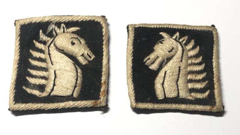 Eastern Command India facing pair od formation signs.