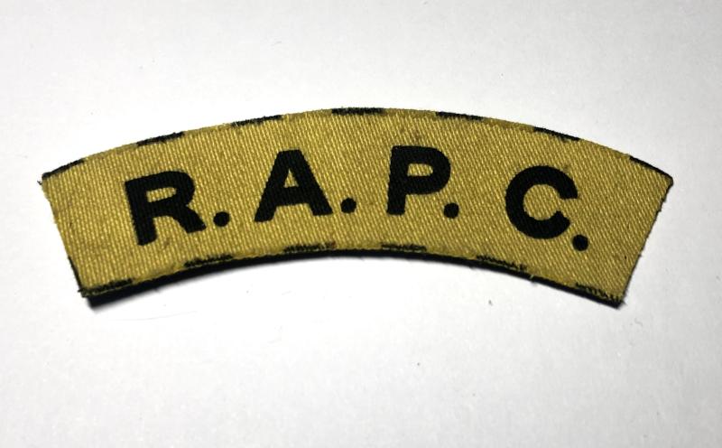 R.A.P.C. WW2 printed Royal Army Pay Corps shoulder title.