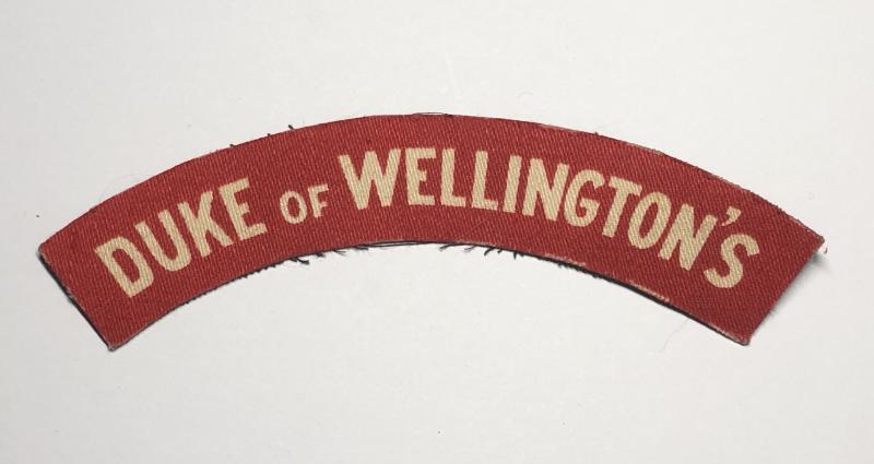 DUKE OF WELLINGTON'S WW2 West Riding Regiment printed infantry shoulder title.