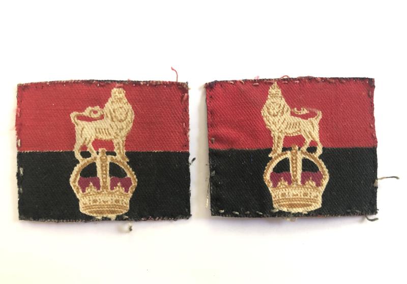 War Office Controlled units facing pair of printed formation signs.