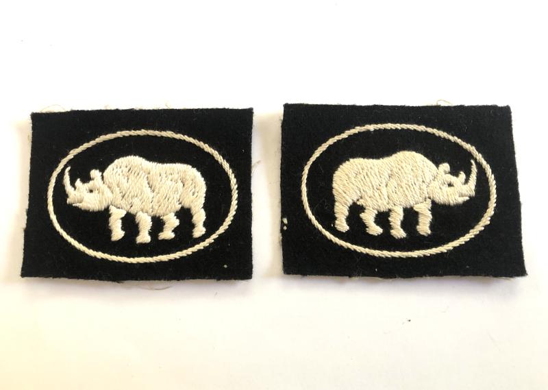 25th Armoured Brigade facing pair of 1950's formation signs.