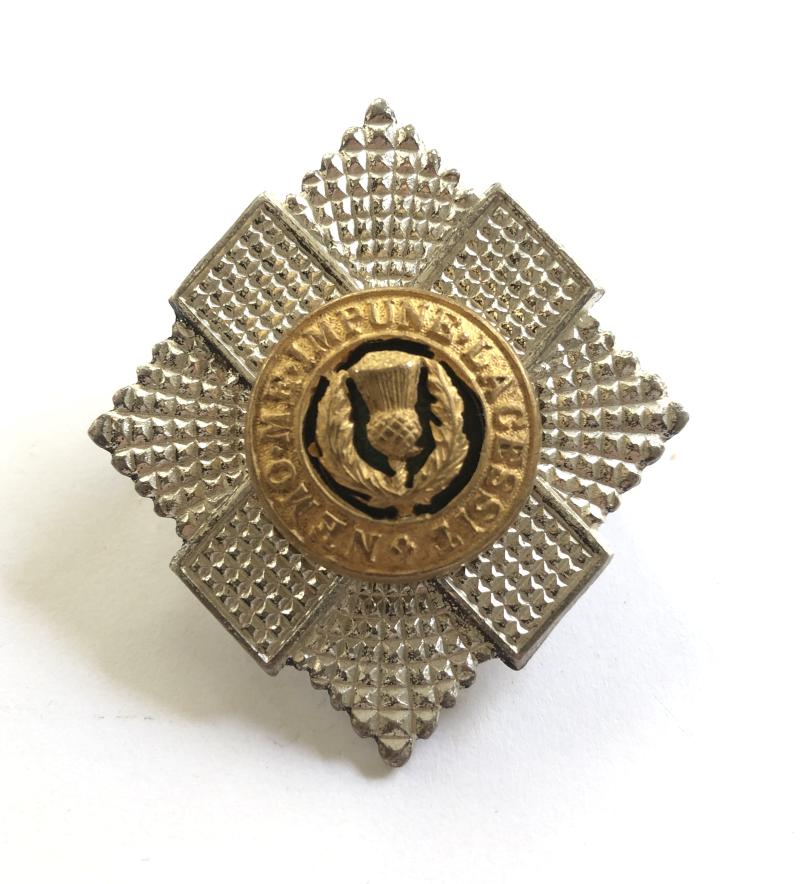 Royal Scots Officers cap badge.